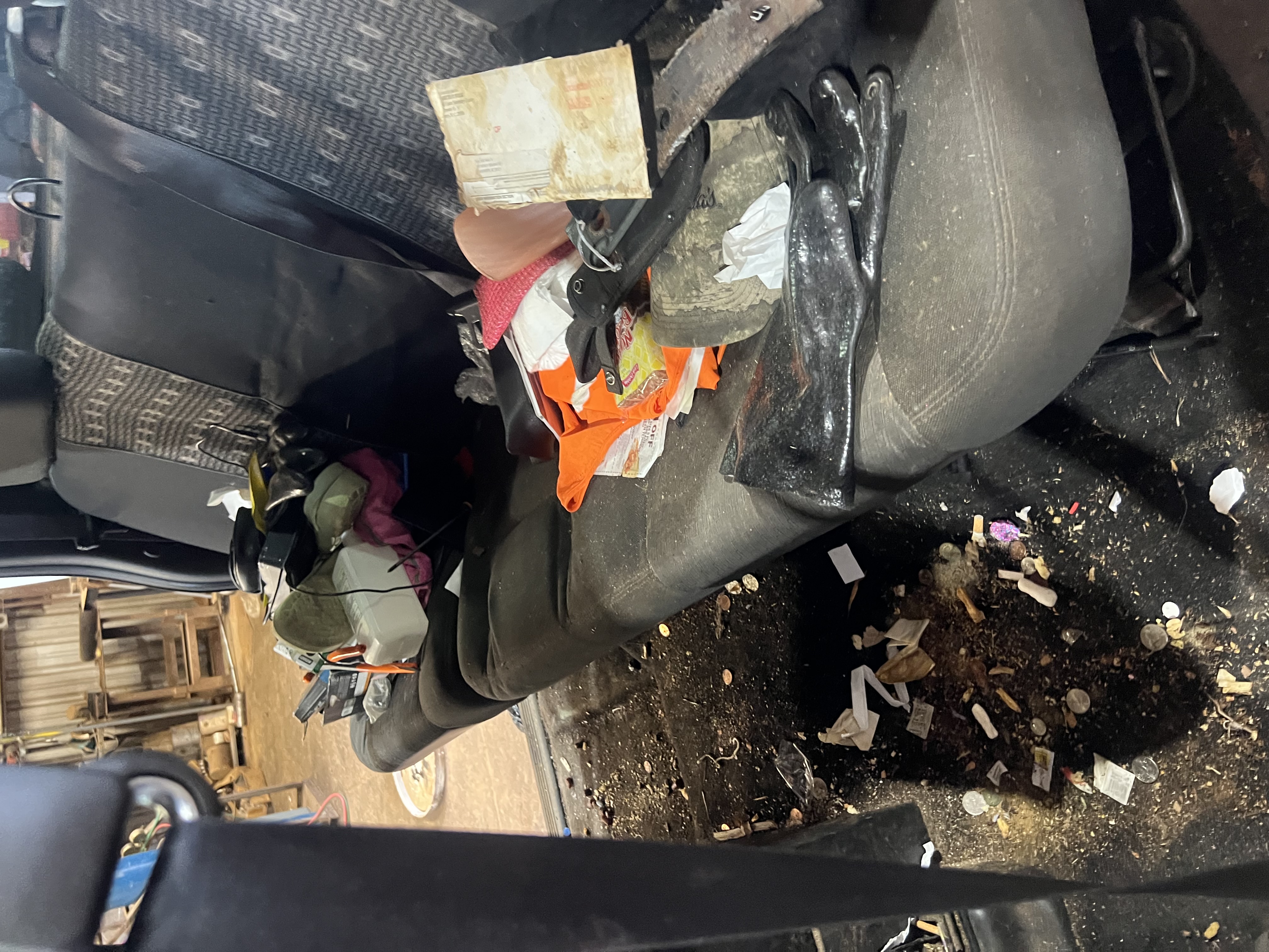 Interior before — trashed back seat
